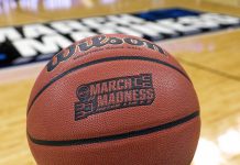 Basketball with a march madness logo on it