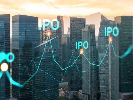 IPO signs with skyline behind