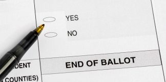 Sample ballot question bubbles with a pen