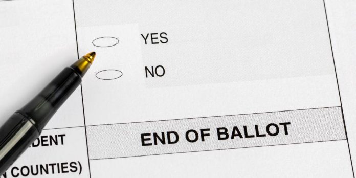 Sample ballot question bubbles with a pen
