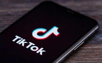 A phone with the TikTok logo on its screen