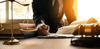 NCPG - lawyer signing papers