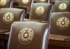 Chairs bearing the state seal of Texas
