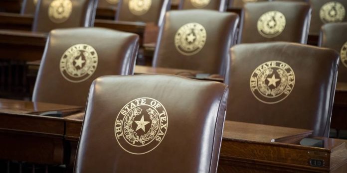 Chairs bearing the state seal of Texas