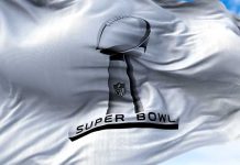Image of the Super Bowl Lombardi trophy on a white flag