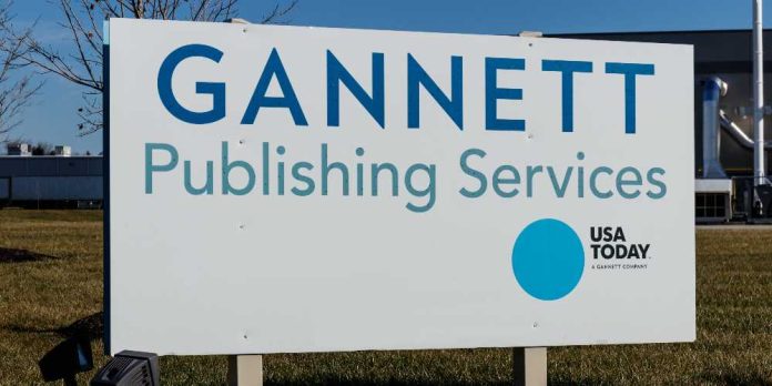 Gannett and US Today logos on a sign
