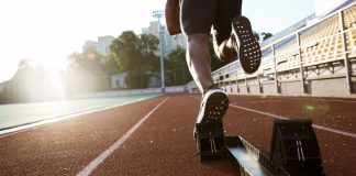 Movement on Georgia sports betting bills already underway Rear view of a runner coming off starting blocks on a track