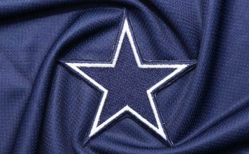 Dallas Cowboys star logo on blue fabric