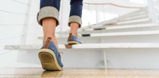 feet walking up a staircase
