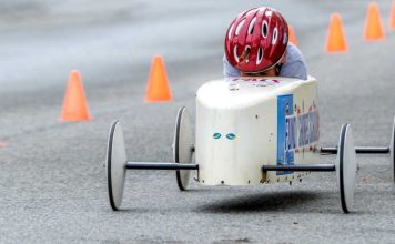 Sopa box derby running down the road