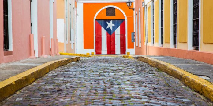 Puerto Rico flag hanging over a stone floor