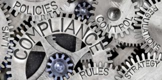 Compliance written on a cog