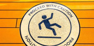 Proceed with caution sign on the floor