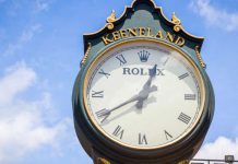 Clock with Keeneland racetrack logo