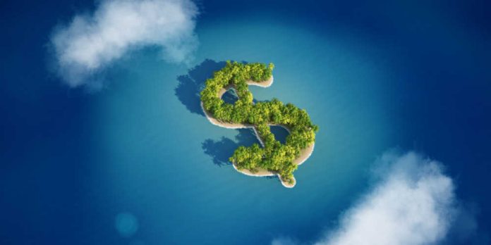 Money shaped island in the ocean