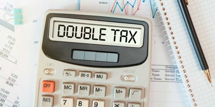 calculator reading Double Tax