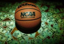 NCAA branded basketball surrounded by money