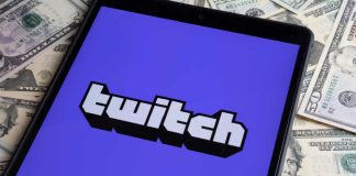 Twitch CEO says streaming regulated gambling sites is ‘no problem’ Twitch logo on phone sitting on stack of money