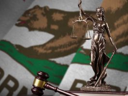 California flag with lady justice statue