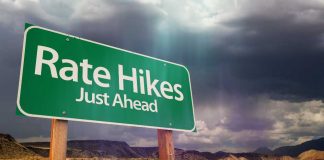 Road sign reading rate hikes just ahead