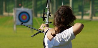 woman aiming for the target