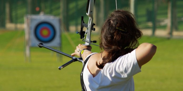 woman aiming for the target