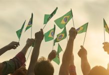Brazil flags being waved in the air