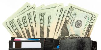 $20 bills in a wallet
