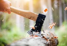 axe chopping tree signalling layoffs