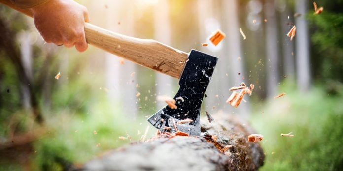 axe chopping tree signalling layoffs