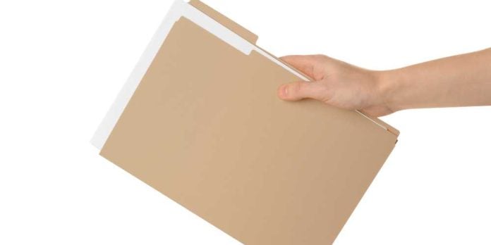 Hand with file folder