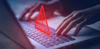 alert on laptop