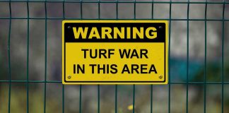 Turf war warning sign