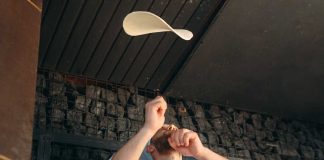 Chef tossing pizza dough