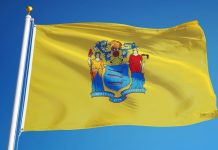 A picture of the New Jersey state flag with a blue background