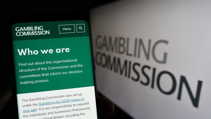 UK Gambling Commission logo and cell phone