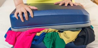 More changes stuffed into Minnesota sports betting bill Overstuffed suitcase