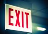 Red and white exit sign