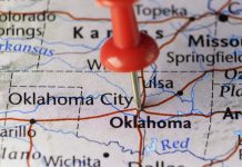 A map of Oklahoma with a pin in it