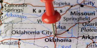 A map of Oklahoma with a pin in it