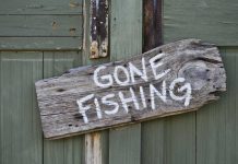Gone Fishing sign on door