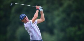 Justin Thomas holding his follow through after a shot