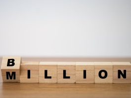 Wooden blocks that spell out the word billion