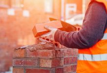 Person laying brick