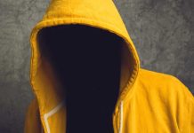 Faceless person in hoodie