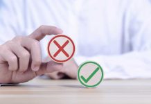 DraftKings calls Jacobs’s claims ‘nonsensical’, ‘utterly false’ Hand holding false symbol