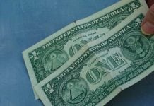 Massachusetts fines Fanatics $15K for unlawful $2 parlay bet Two one dollar bills