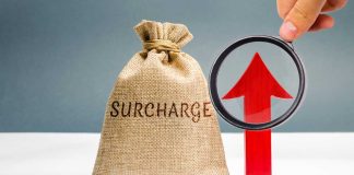 Bag with surcharge written on it