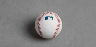 MLB players union sues four sportsbooks over photo use baseball with MLB logo on it