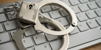 CNIGA Chair says all forms of DFS and sweepstakes gaming are illegal Handcuff and keyboard